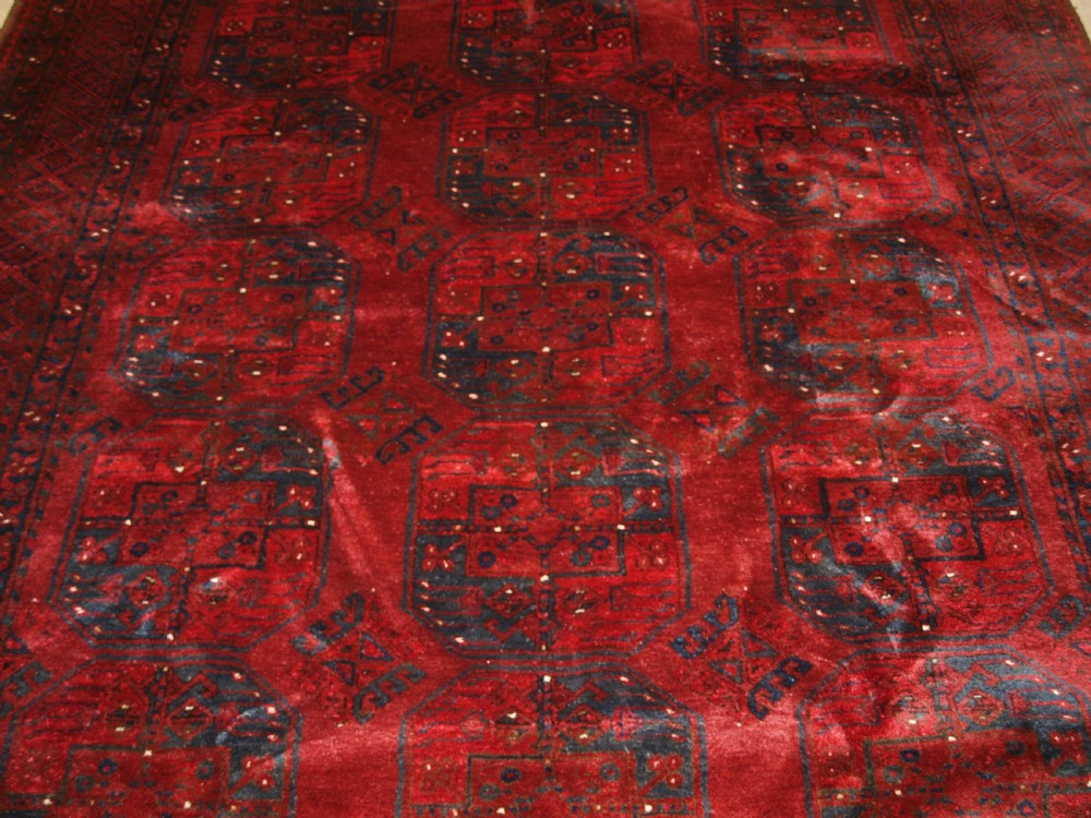 OLD RED AFGHAN VILLAGE CARPET, OUTSTANDING CONDITION, DEEP RED COLOUR, CIRCA 1920. View V