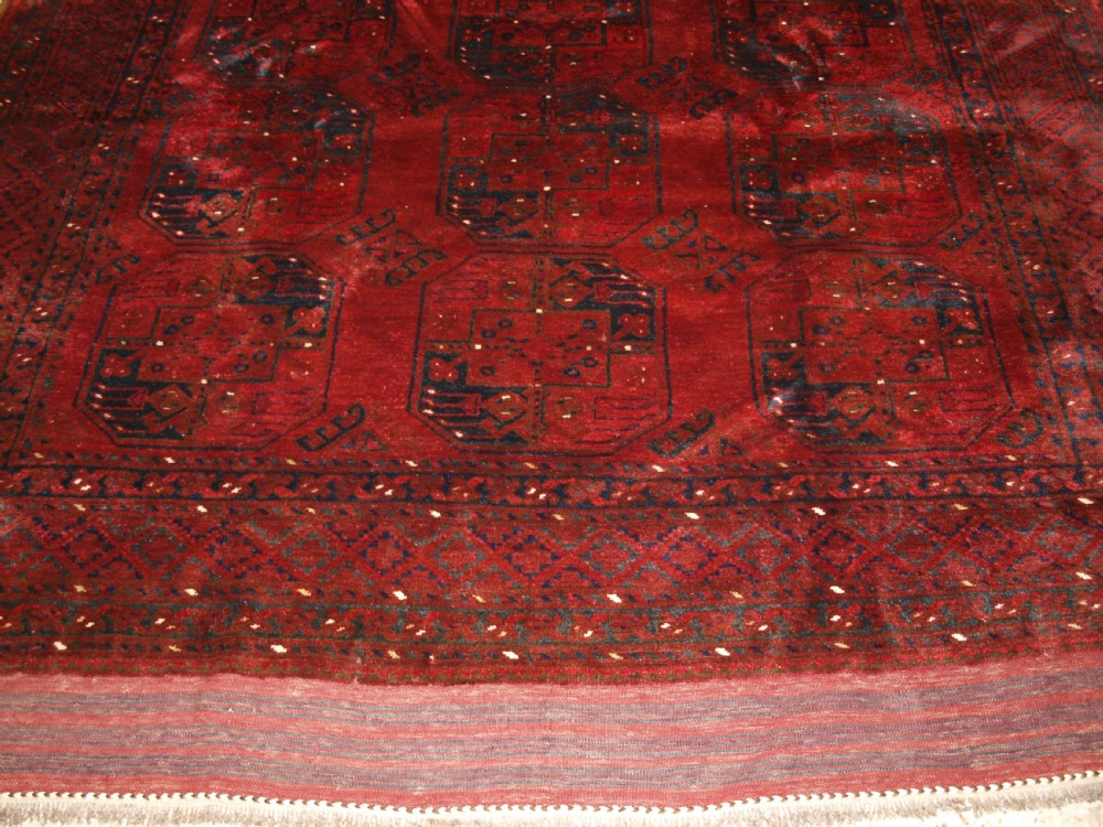OLD RED AFGHAN VILLAGE CARPET, OUTSTANDING CONDITION, DEEP RED COLOUR, CIRCA 1920. View VI