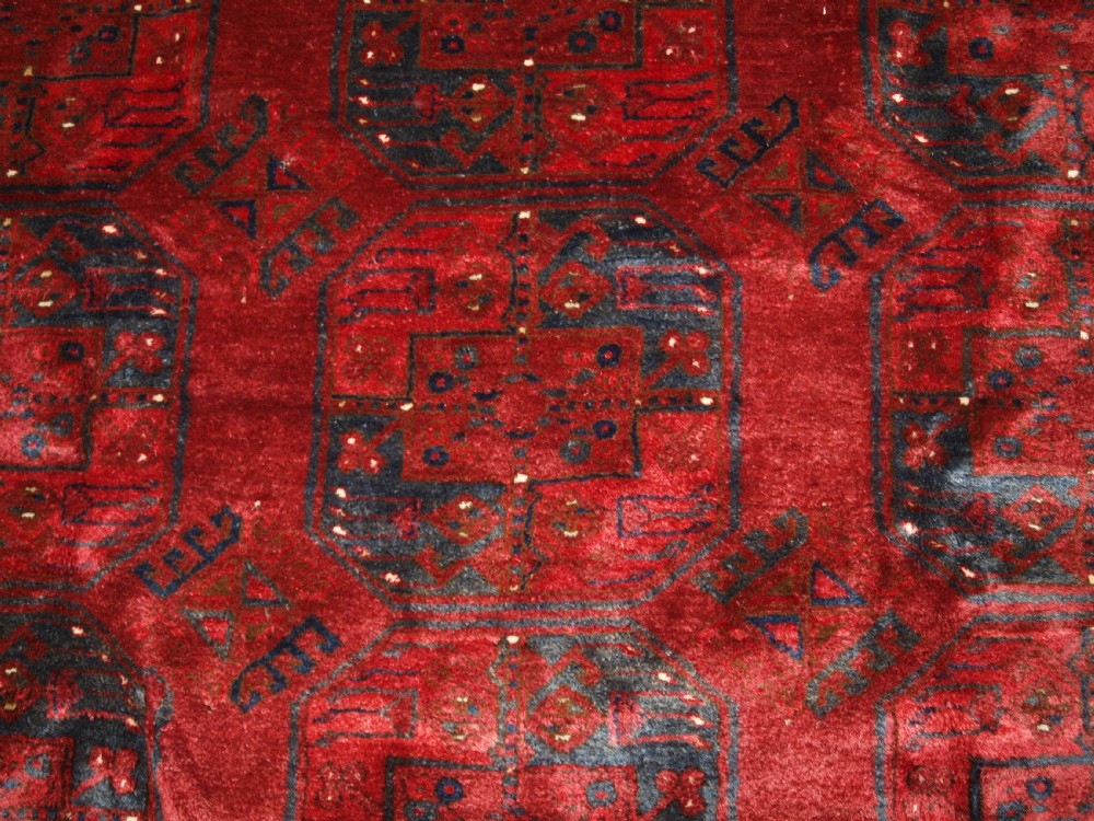 OLD RED AFGHAN VILLAGE CARPET, OUTSTANDING CONDITION, DEEP RED COLOUR, CIRCA 1920. View VII