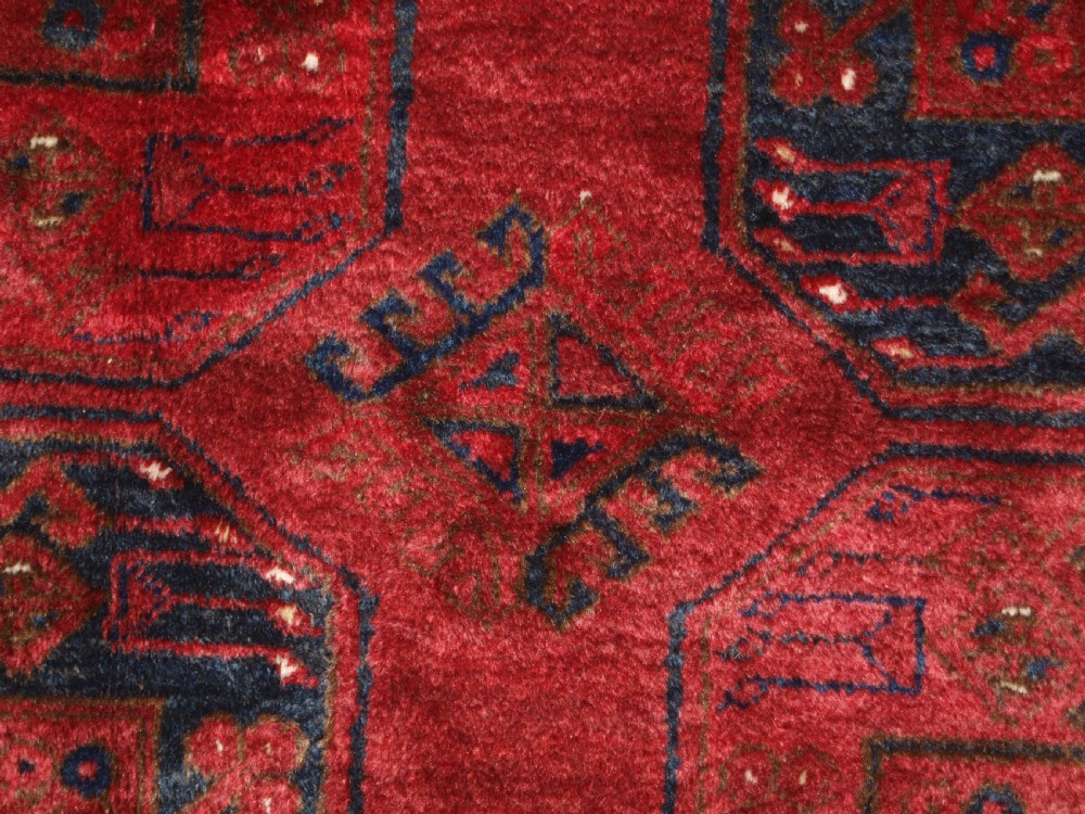 OLD RED AFGHAN VILLAGE CARPET, OUTSTANDING CONDITION, DEEP RED COLOUR, CIRCA 1920. View VIII