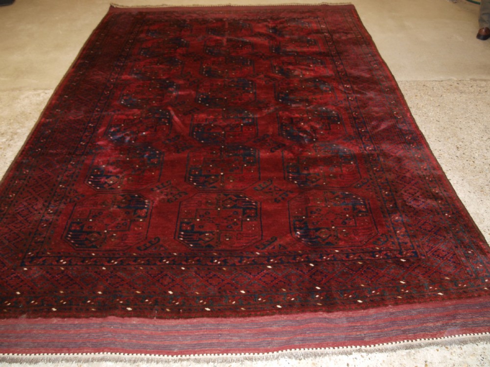 OLD RED AFGHAN VILLAGE CARPET, OUTSTANDING CONDITION, DEEP RED COLOUR, CIRCA 1920. View XI