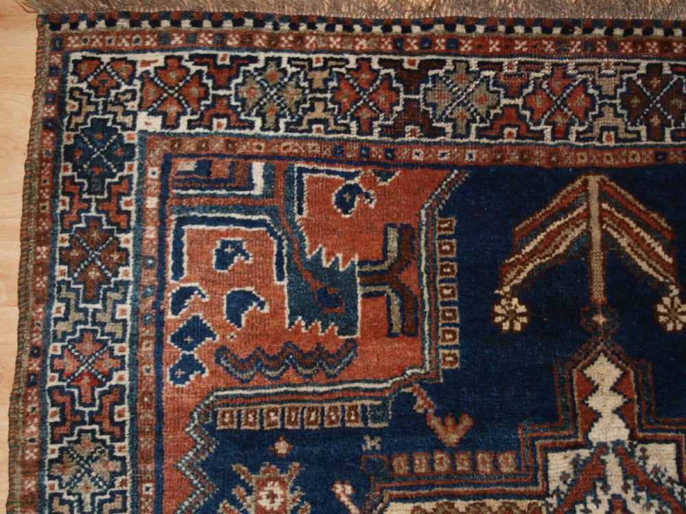 ANTIQUE RUG BY THE LURI TRIBE, SMALL TRIBAL RUG, CIRCA 1900. View III