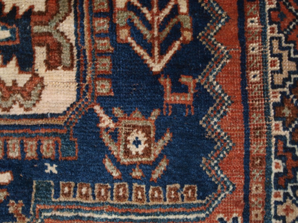 ANTIQUE RUG BY THE LURI TRIBE, SMALL TRIBAL RUG, CIRCA 1900. View VIII