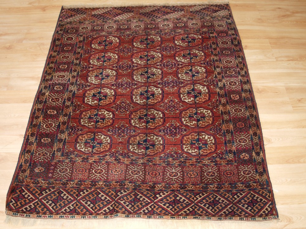 ANTIQUE TEKKE TURKMEN RUG OF SMALL SIZE, GOOD COLOUR, LATE 19TH CENTURY.