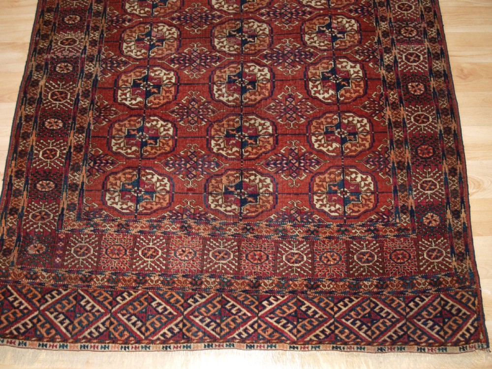 ANTIQUE TEKKE TURKMEN RUG OF SMALL SIZE, GOOD COLOUR, LATE 19TH CENTURY. View VI