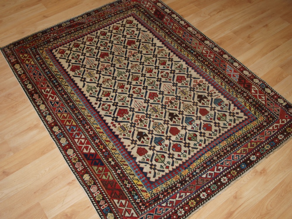 ANTIQUE CAUCASIAN DAGHESTAN RUG WITH IVORY GROUND FLORAL LATTICE, SUPERB, CIRCA 1880. View II