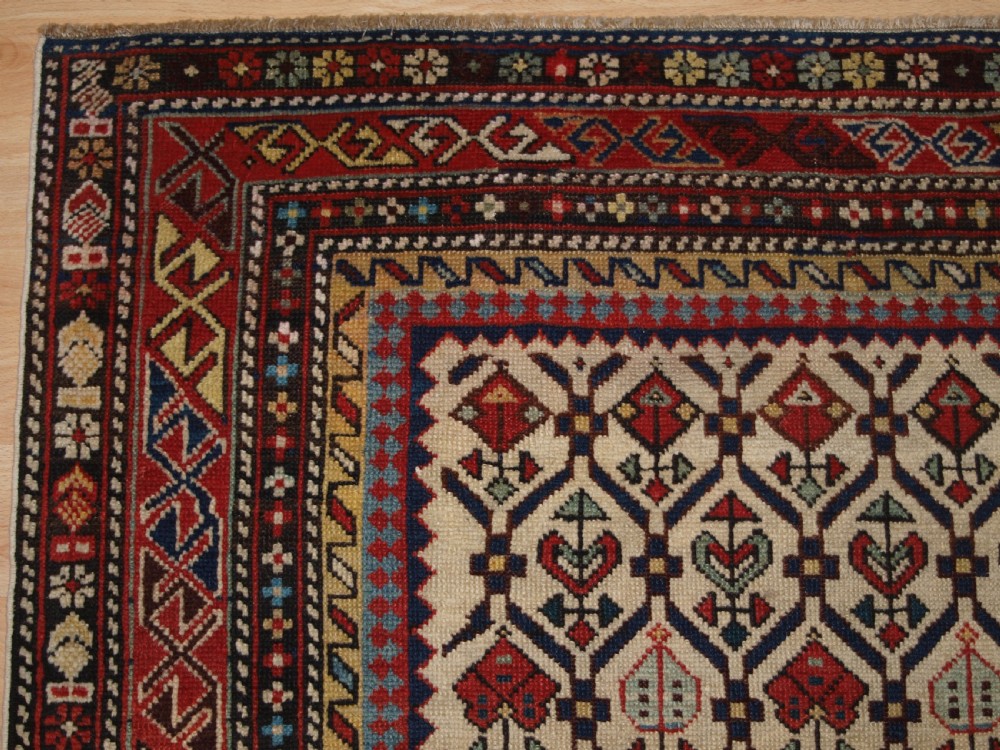 ANTIQUE CAUCASIAN DAGHESTAN RUG WITH IVORY GROUND FLORAL LATTICE, SUPERB, CIRCA 1880. View III