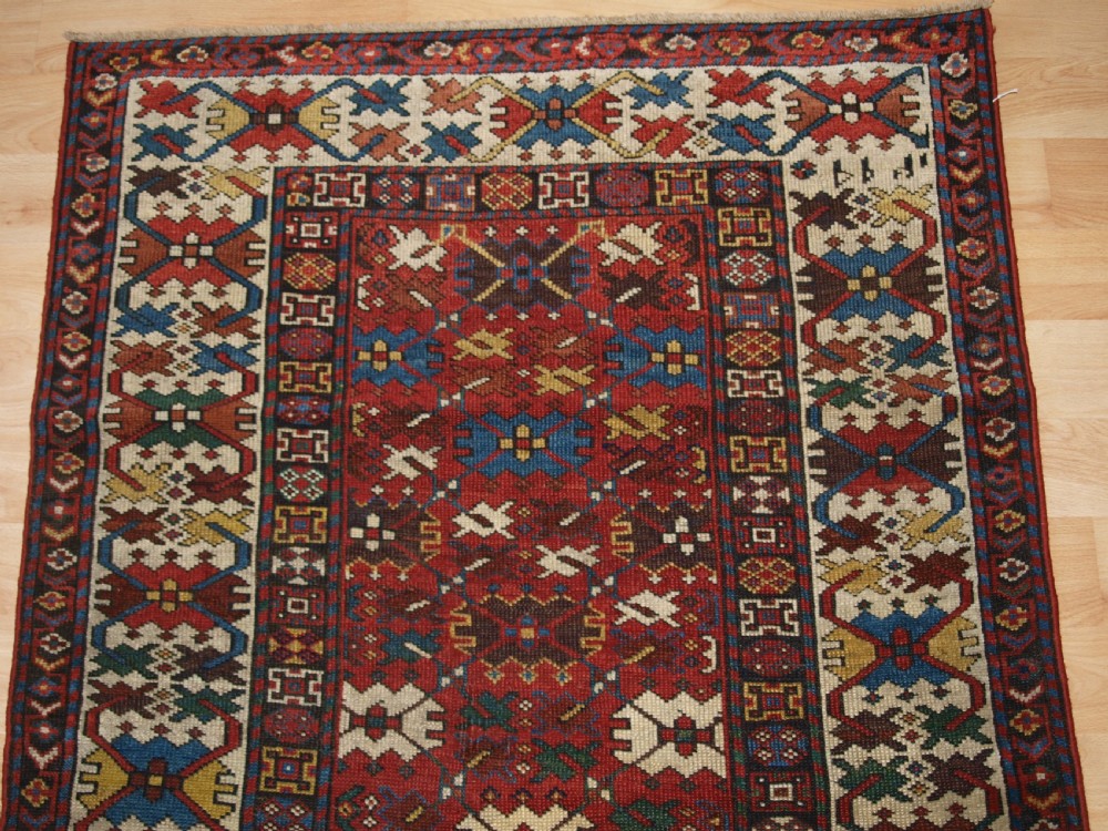 ANTIQUE CAUCASIAN SHIRVAN RUG, LATTICE DESIGN, GOOD COLOUR, DATED 1306 (1888). View III