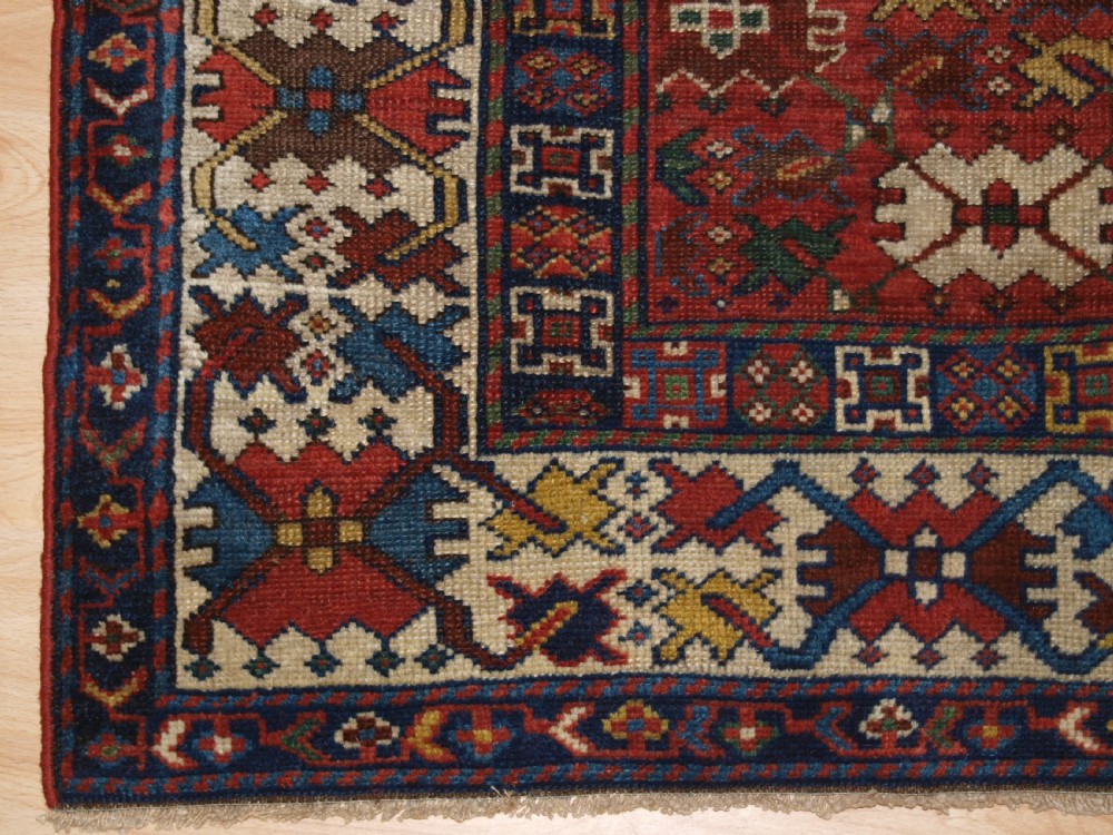 ANTIQUE CAUCASIAN SHIRVAN RUG, LATTICE DESIGN, GOOD COLOUR, DATED 1306 (1888). View VI