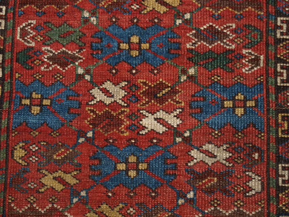 ANTIQUE CAUCASIAN SHIRVAN RUG, LATTICE DESIGN, GOOD COLOUR, DATED 1306 (1888). View VIII