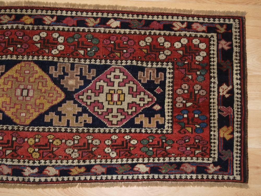 ANTIQUE KURDISH MAFRASH PANEL, BEDDING BAG SIDE PANEL, CIRCA 1900. View IV