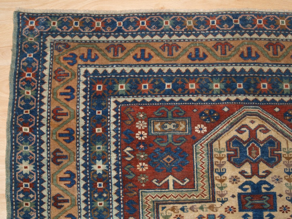 ANTIQUE CAUCASIAN DERBENT PRAYER RUG IN CLASSIC KAZAK PRAYER DESIGN, CIRCA 1900. View II