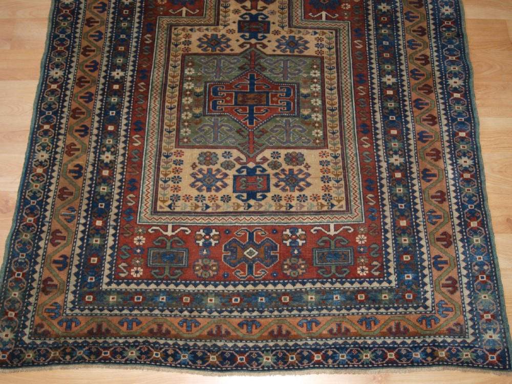 ANTIQUE CAUCASIAN DERBENT PRAYER RUG IN CLASSIC KAZAK PRAYER DESIGN, CIRCA 1900. View V