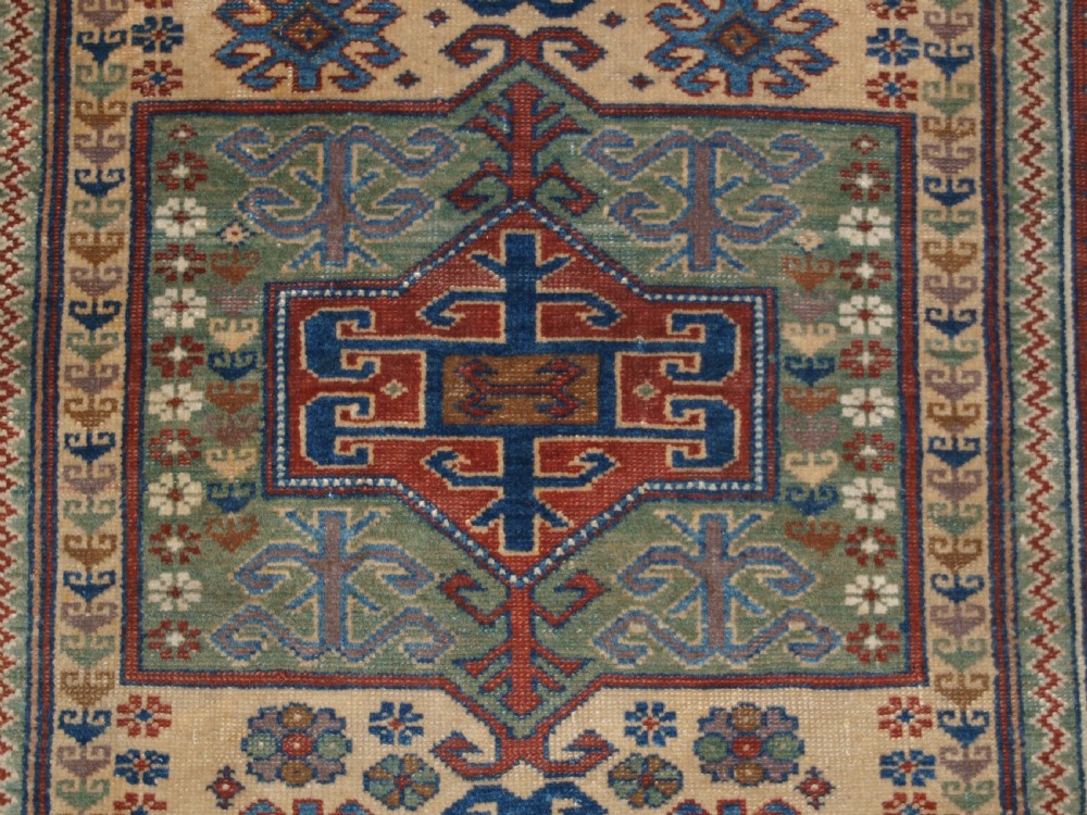 ANTIQUE CAUCASIAN DERBENT PRAYER RUG IN CLASSIC KAZAK PRAYER DESIGN, CIRCA 1900. View VI