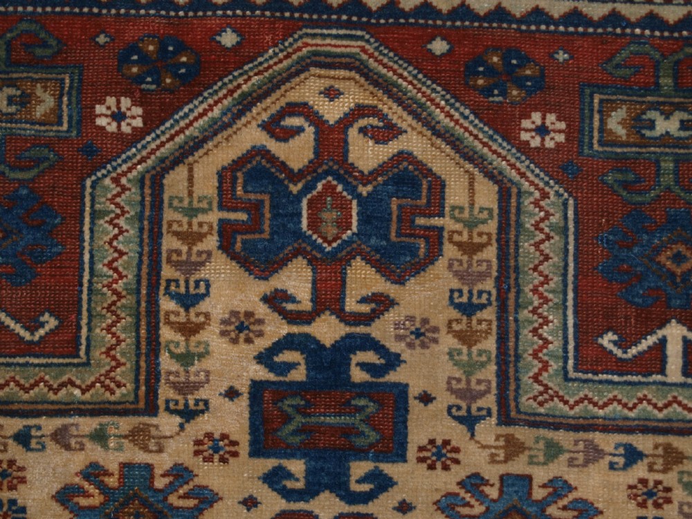 ANTIQUE CAUCASIAN DERBENT PRAYER RUG IN CLASSIC KAZAK PRAYER DESIGN, CIRCA 1900. View VIII
