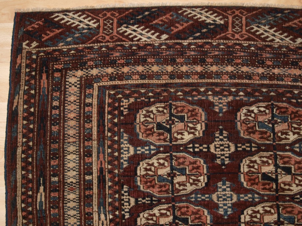 ANTIQUE TEKKE TURKMEN RUG OF SMALL SIZE, RICH RED BROWN COLOUR, CIRCA 1900. View III