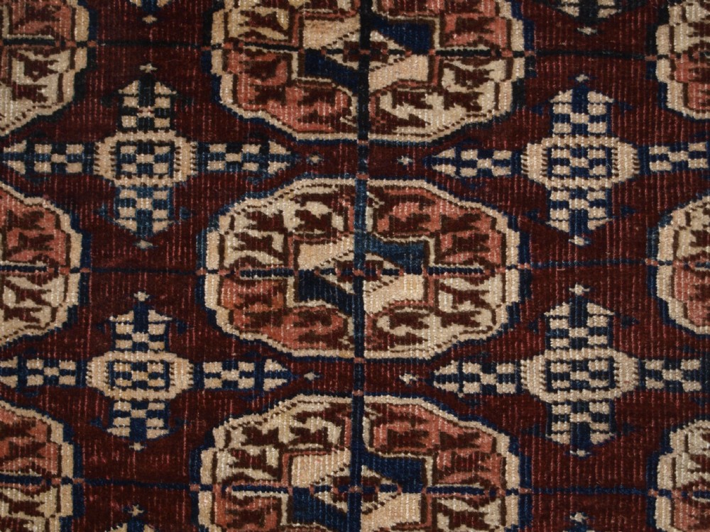 ANTIQUE TEKKE TURKMEN RUG OF SMALL SIZE, RICH RED BROWN COLOUR, CIRCA 1900. View VIII