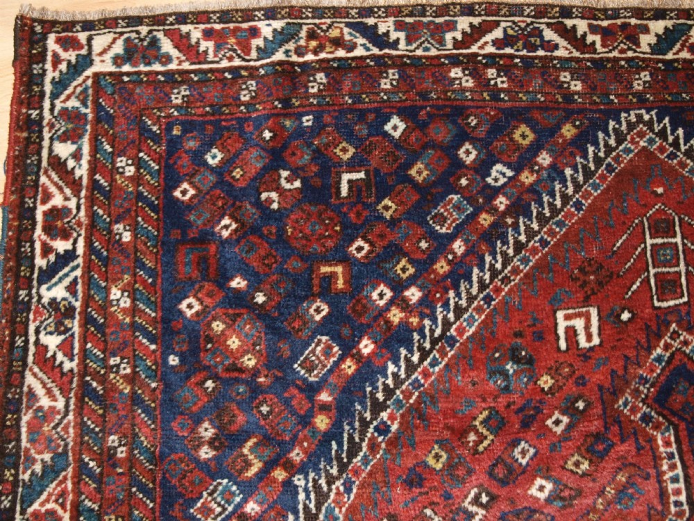 OLD SHIRAZ REGION RUG, TRIBAL DESIGN, CIRCA 1920. View III