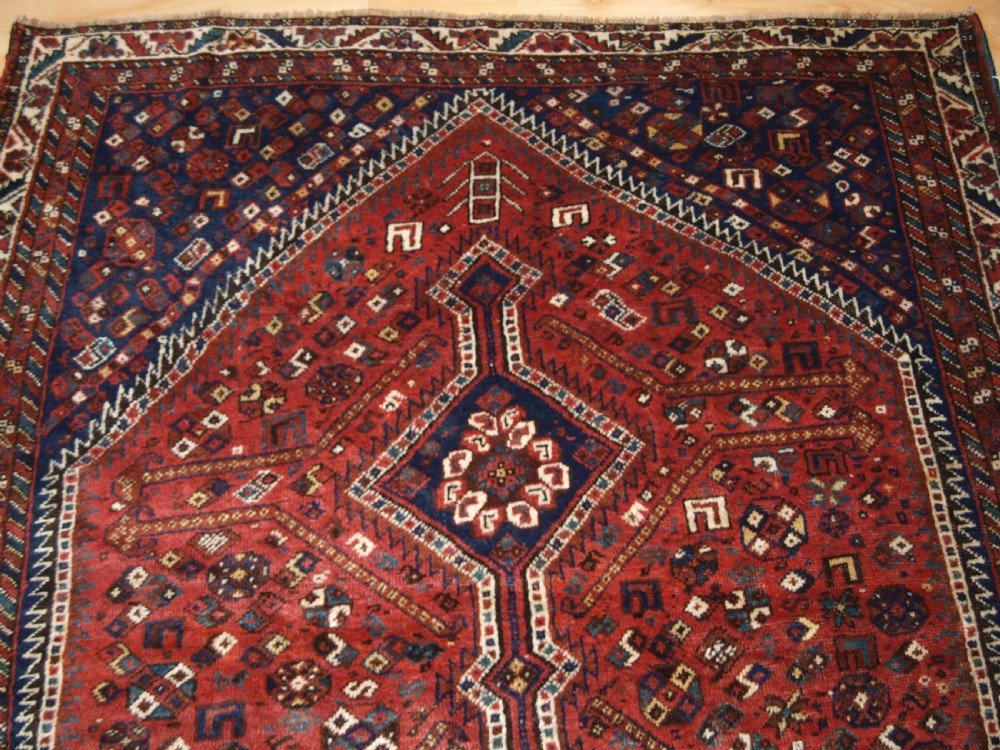 OLD SHIRAZ REGION RUG, TRIBAL DESIGN, CIRCA 1920. View IV