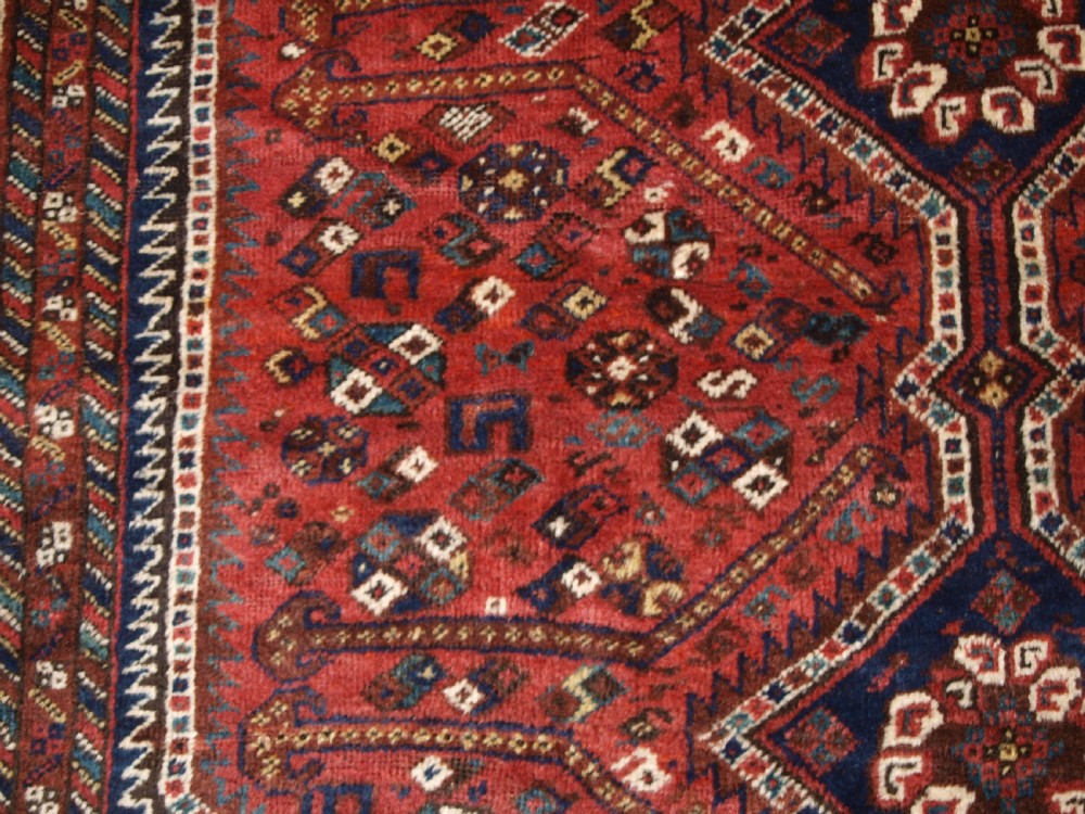 OLD SHIRAZ REGION RUG, TRIBAL DESIGN, CIRCA 1920. View VIII