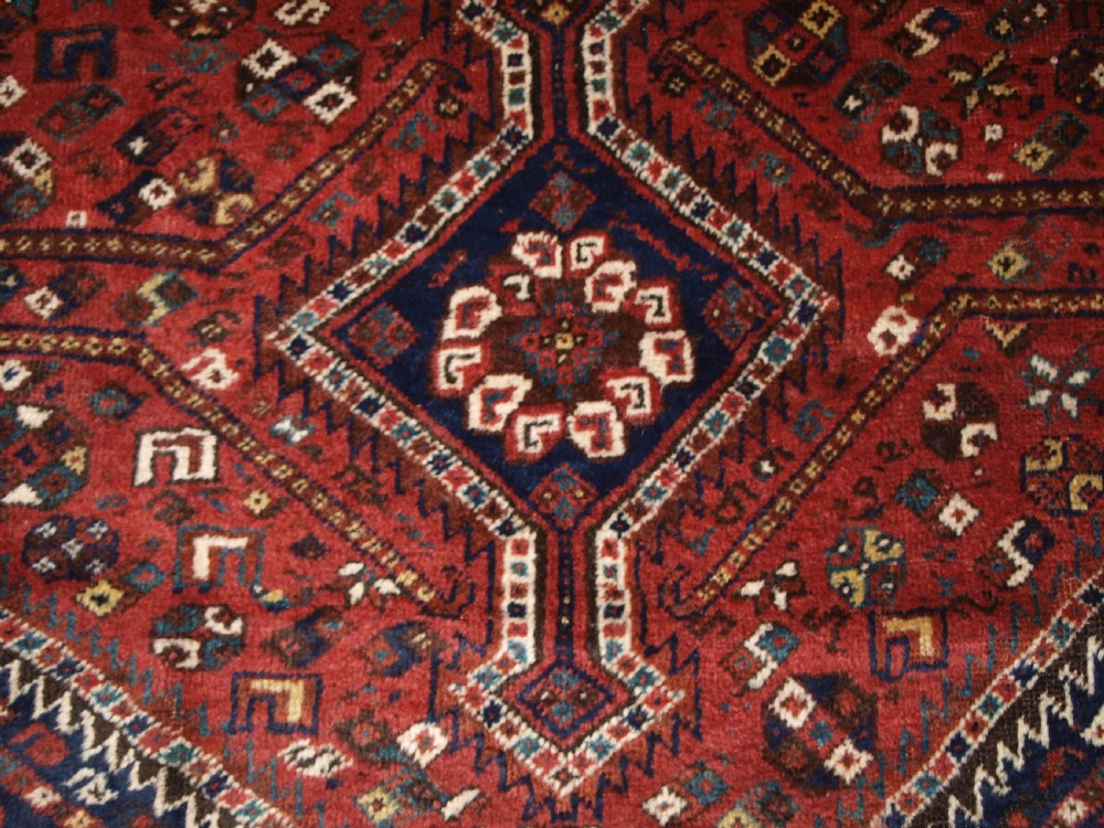 OLD SHIRAZ REGION RUG, TRIBAL DESIGN, CIRCA 1920. View IX