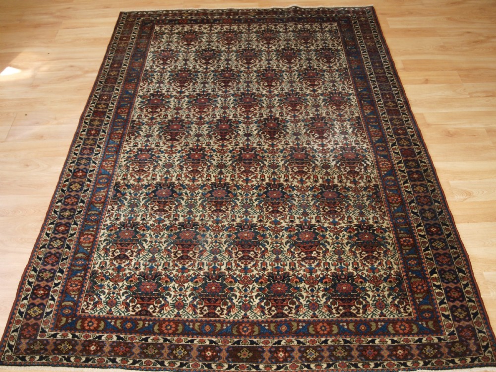 ANTIQUE PERSIAN ABEDEH RUG WITH VASE AND PEACOCK DESIGN, SUPERB COLOURS, CIRCA 1900.