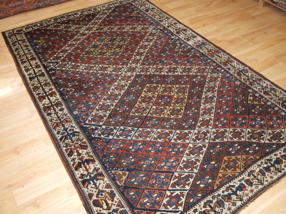 ANTIQUE KURDISH RUG WITH LATTICE DESIGN, VISUALLY STRIKING RUG, CIRCA 1900. View II