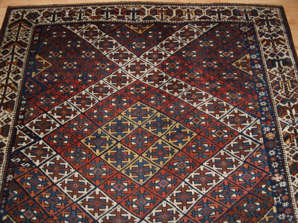 ANTIQUE KURDISH RUG WITH LATTICE DESIGN, VISUALLY STRIKING RUG, CIRCA 1900. View IV