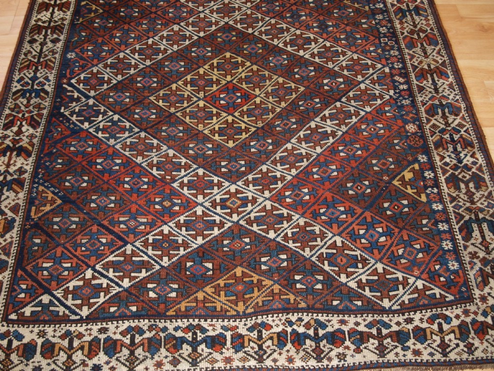 ANTIQUE KURDISH RUG WITH LATTICE DESIGN, VISUALLY STRIKING RUG, CIRCA 1900. View VI