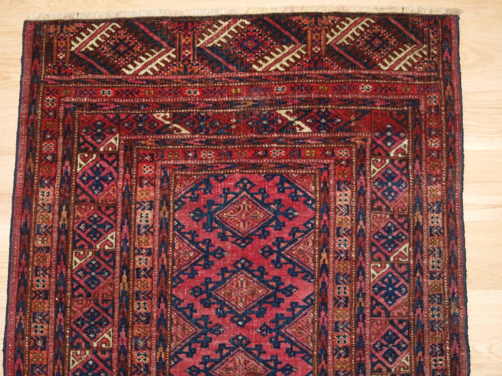 ANTIQUE SARYK TURKMEN RUG OF VERY SMALL SIZE, COCHINEAL DYES, CIRCA 1900. View II