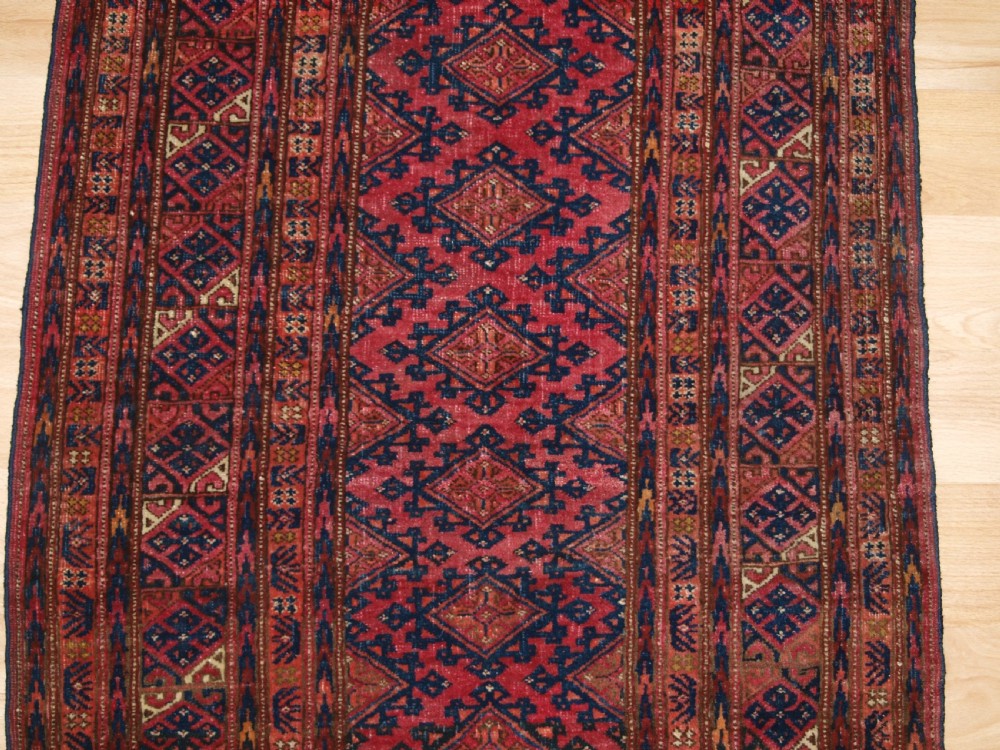 ANTIQUE SARYK TURKMEN RUG OF VERY SMALL SIZE, COCHINEAL DYES, CIRCA 1900. View III