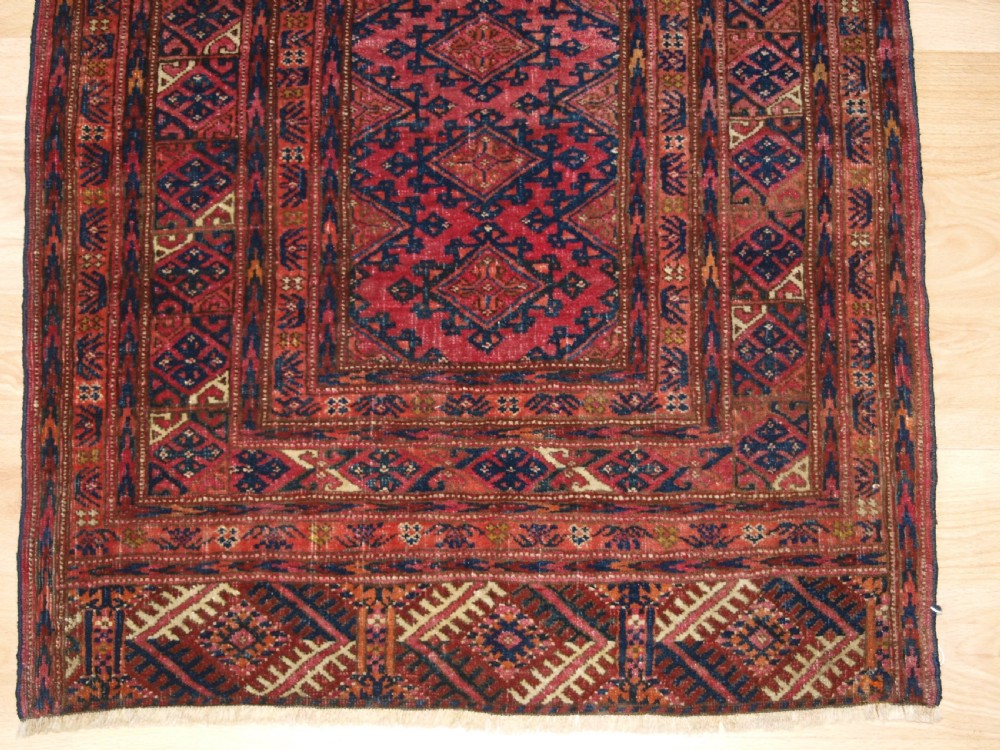 ANTIQUE SARYK TURKMEN RUG OF VERY SMALL SIZE, COCHINEAL DYES, CIRCA 1900. View IV