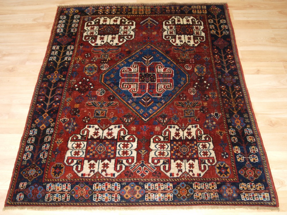 ANTIQUE PERSIAN TRIBAL QASHQAI RUG, SUPERB COLOUR AND DESIGN, CIRCA 1900.