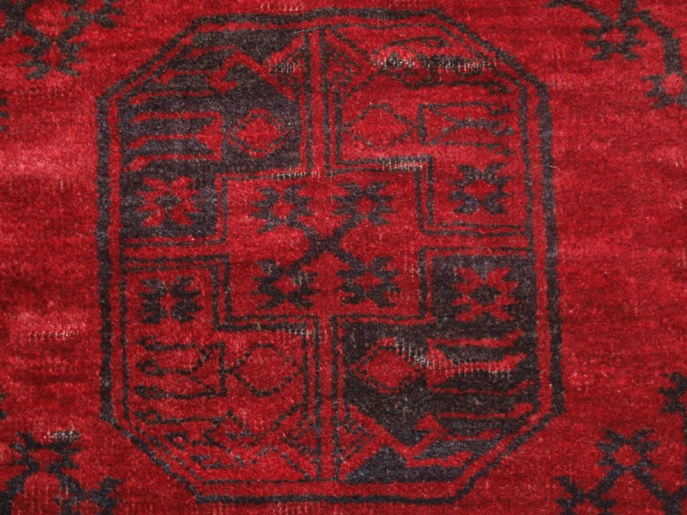 OLD RED AFGHAN VILLAGE CARPET, SLIGHT TENSION PROBLEM HENCE THE LOW PRICE, CIRCA 1920. View VII