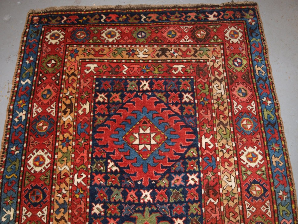 ANTIQUE CAUCASIAN LONG RUG OR RUNNER WITH MEDALLION DESIGN, SUPERB COLOURS, CIRCA 1900. View III
