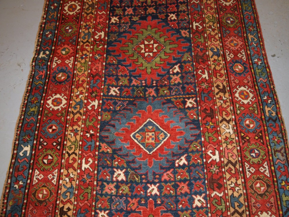 ANTIQUE CAUCASIAN LONG RUG OR RUNNER WITH MEDALLION DESIGN, SUPERB COLOURS, CIRCA 1900. View V
