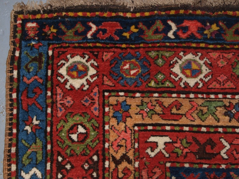 ANTIQUE CAUCASIAN LONG RUG OR RUNNER WITH MEDALLION DESIGN, SUPERB COLOURS, CIRCA 1900. View VII