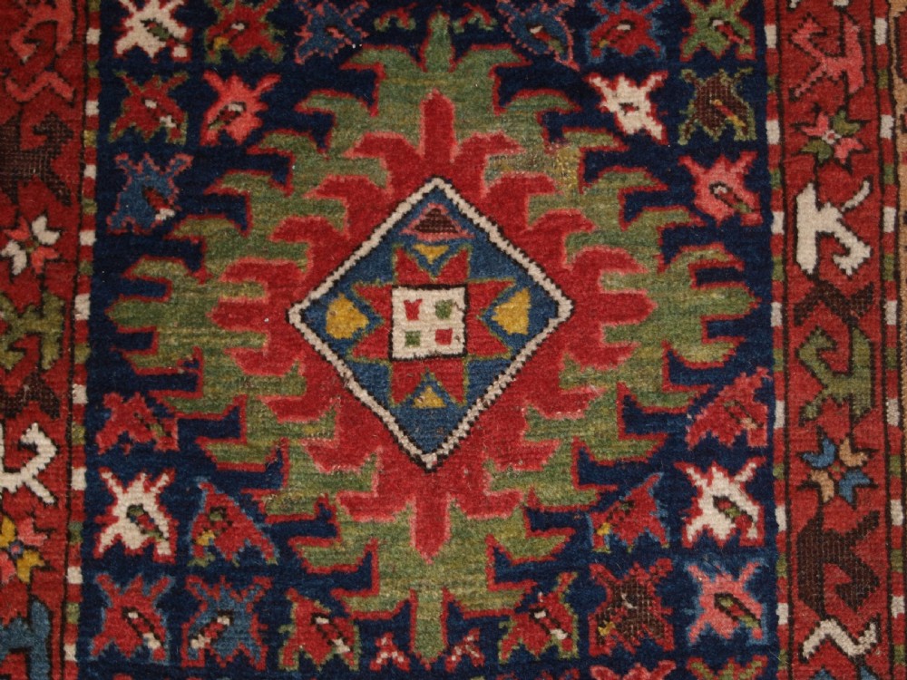 ANTIQUE CAUCASIAN LONG RUG OR RUNNER WITH MEDALLION DESIGN, SUPERB COLOURS, CIRCA 1900. View VIII