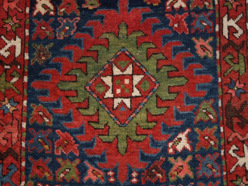 ANTIQUE CAUCASIAN LONG RUG OR RUNNER WITH MEDALLION DESIGN, SUPERB COLOURS, CIRCA 1900. View XI