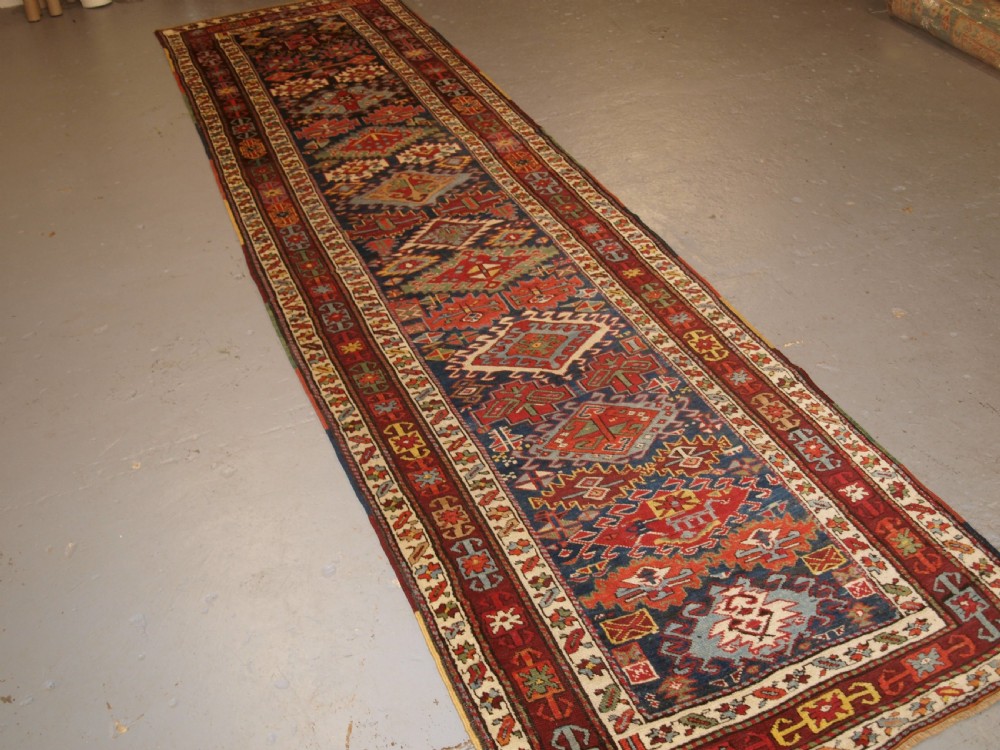 ANTIQUE KURDISH RUNNER, EXCELLENT DESIGN AND SUPERB COLOUR. CIRCA 1890. View II