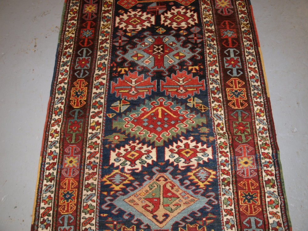 ANTIQUE KURDISH RUNNER, EXCELLENT DESIGN AND SUPERB COLOUR. CIRCA 1890. View IV