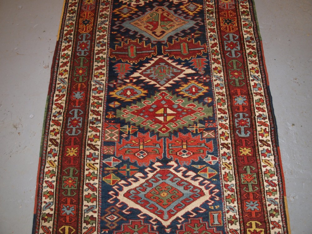 ANTIQUE KURDISH RUNNER, EXCELLENT DESIGN AND SUPERB COLOUR. CIRCA 1890. View V