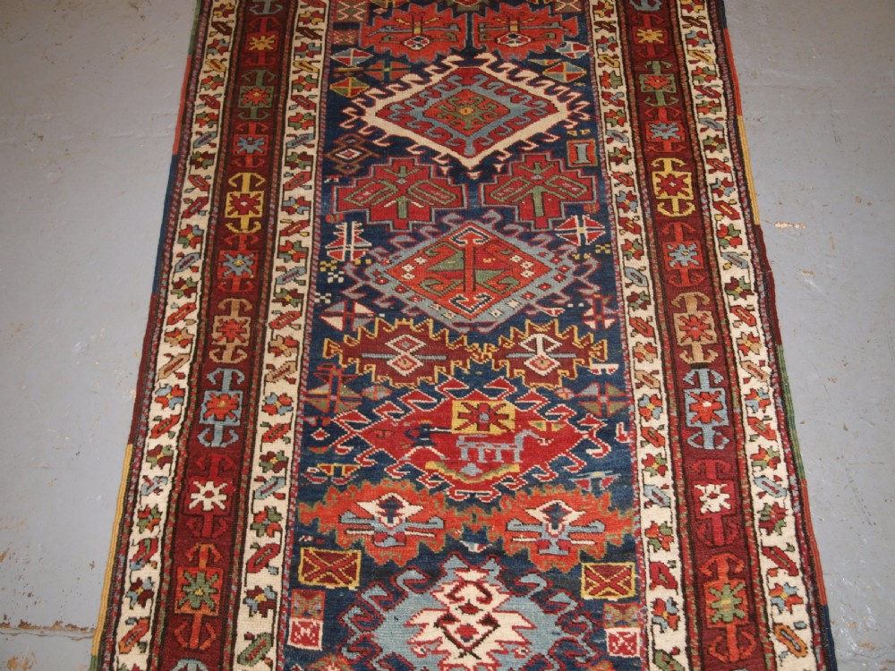 ANTIQUE KURDISH RUNNER, EXCELLENT DESIGN AND SUPERB COLOUR. CIRCA 1890. View VI