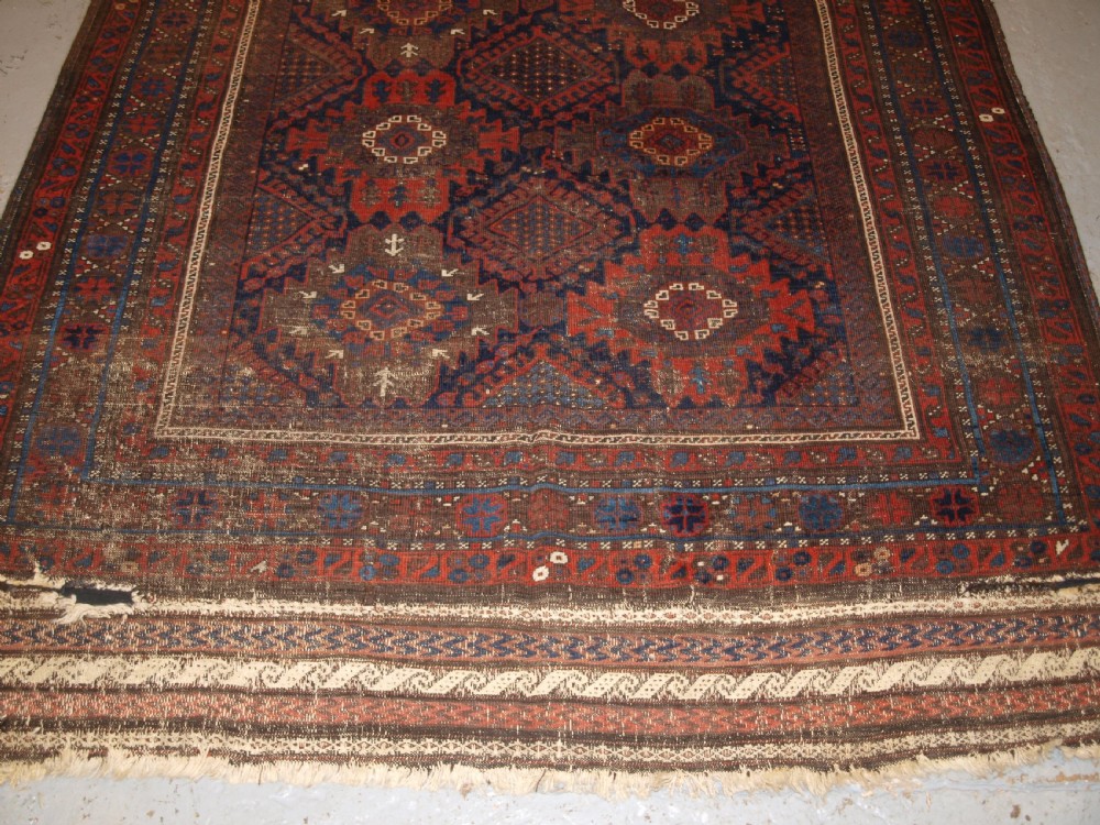 ANTIQUE TIMURI BALUCH MAIN CARPET, OUTSTANDING COLOUR, EX WISDOM COLLECTION. 2ND HALF 19TH CENTURY. View V