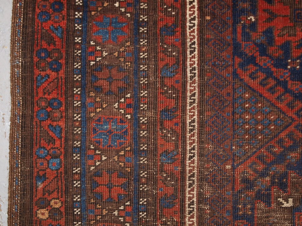 ANTIQUE TIMURI BALUCH MAIN CARPET, OUTSTANDING COLOUR, EX WISDOM COLLECTION. 2ND HALF 19TH CENTURY. View VI