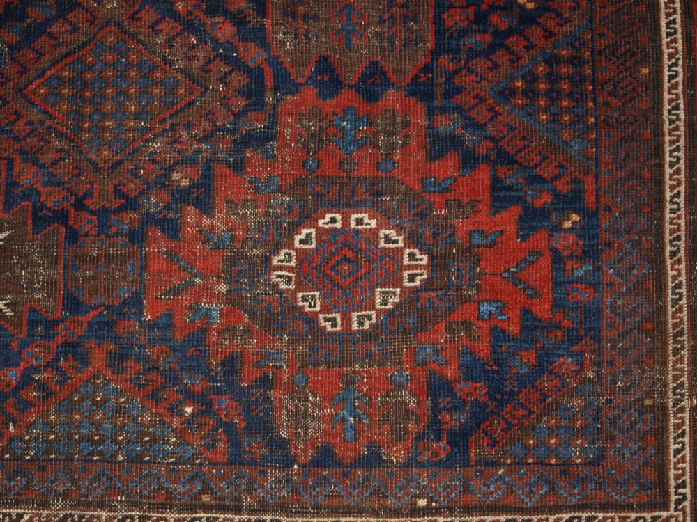 ANTIQUE TIMURI BALUCH MAIN CARPET, OUTSTANDING COLOUR, EX WISDOM COLLECTION. 2ND HALF 19TH CENTURY. View IX