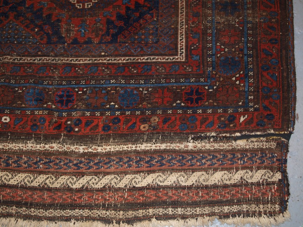 ANTIQUE TIMURI BALUCH MAIN CARPET, OUTSTANDING COLOUR, EX WISDOM COLLECTION. 2ND HALF 19TH CENTURY. View X