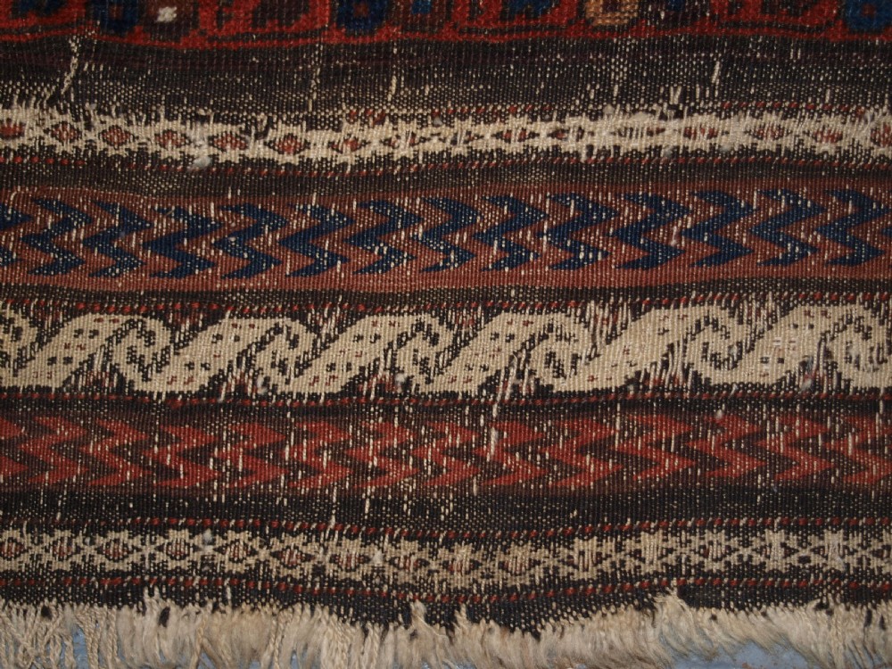 ANTIQUE TIMURI BALUCH MAIN CARPET, OUTSTANDING COLOUR, EX WISDOM COLLECTION. 2ND HALF 19TH CENTURY. View XI