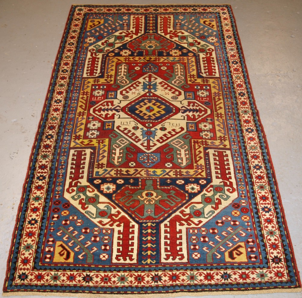 ANTIQUE CAUCASIAN KASIM-USAG RUG, CLASSIC DESIGN WITH SUPERB COLOUR, DATED, 1893.