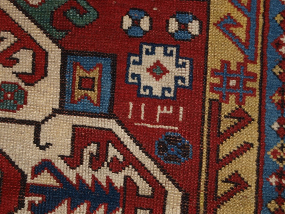 ANTIQUE CAUCASIAN KASIM-USAG RUG, CLASSIC DESIGN WITH SUPERB COLOUR, DATED, 1893. View XIV
